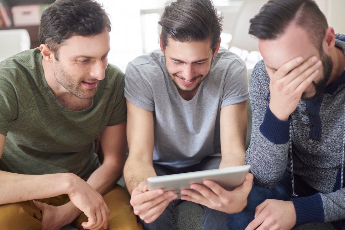 Friends Browsing Photos From Their Old Times PVN2FNW